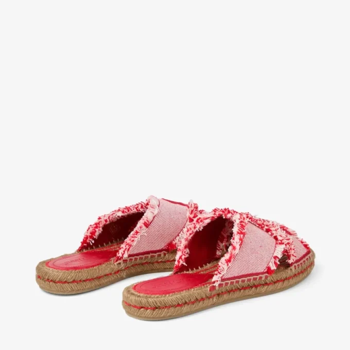 Aciel platte sandaal in rubyrood Mix van platte sandaaltjes van gerafeld canvas met spikkels Aciel platte sandaal in rubyrood Mix van platte sandaaltjes van gerafeld canvas met spikkels