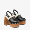 Alida Platform 135 Zwarte glanzende kalfsleren slingbacks met schapenvacht Alida Platform 135 Zwarte glanzende kalfsleren slingbacks met schapenvacht