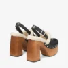 Alida Platform 135 Zwarte glanzende kalfsleren slingbacks met schapenvacht Alida Platform 135 Zwarte glanzende kalfsleren slingbacks met schapenvacht
