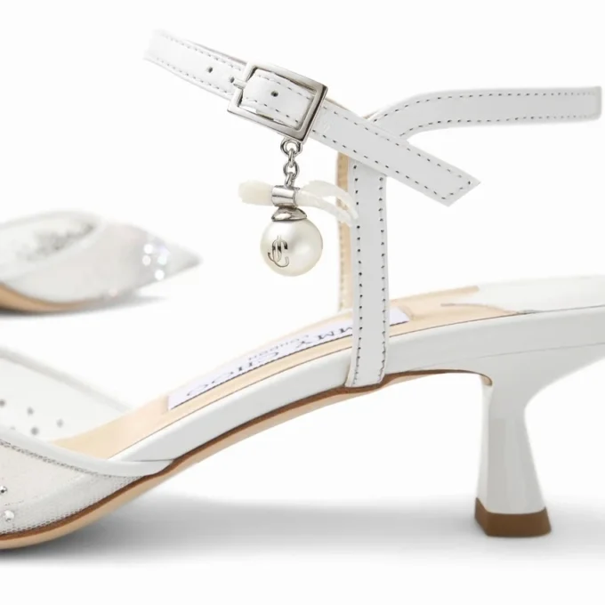 Aren Slingback 45 Witte slingbacks van mesh met kristallen en parelbedeltje Aren Slingback 45 Witte slingbacks van mesh met kristallen en parelbedeltje