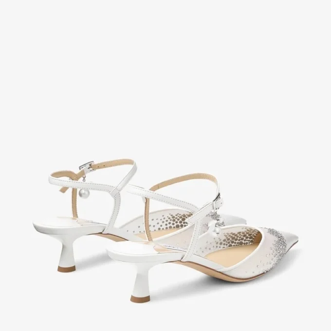 Aren Slingback 45 Witte slingbacks van mesh met kristallen en parelbedeltje Aren Slingback 45 Witte slingbacks van mesh met kristallen en parelbedeltje