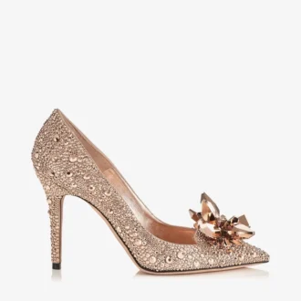 Avril roségouden pumps met puntige neus en kristallen