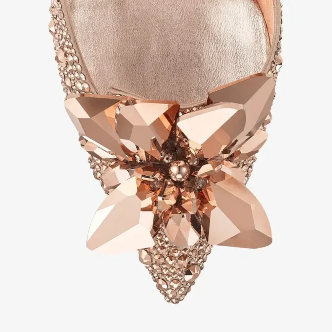 Avril roségouden pumps met puntige neus en kristallen