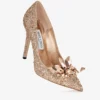 Avril roségouden pumps met puntige neus en kristallen