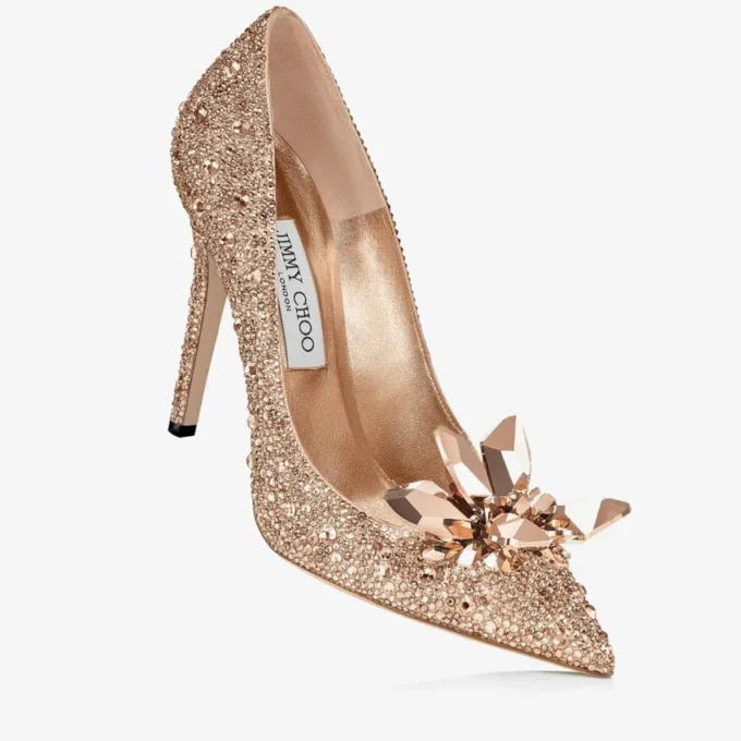 Avril roségouden pumps met puntige neus en kristallen