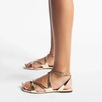 Ayla platte sandalen van goudkleurig metallic leer