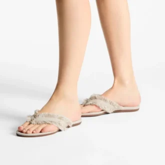 Bay Flat Amandelkleurige platte sandalen van gerafeld canvas met vlekjes