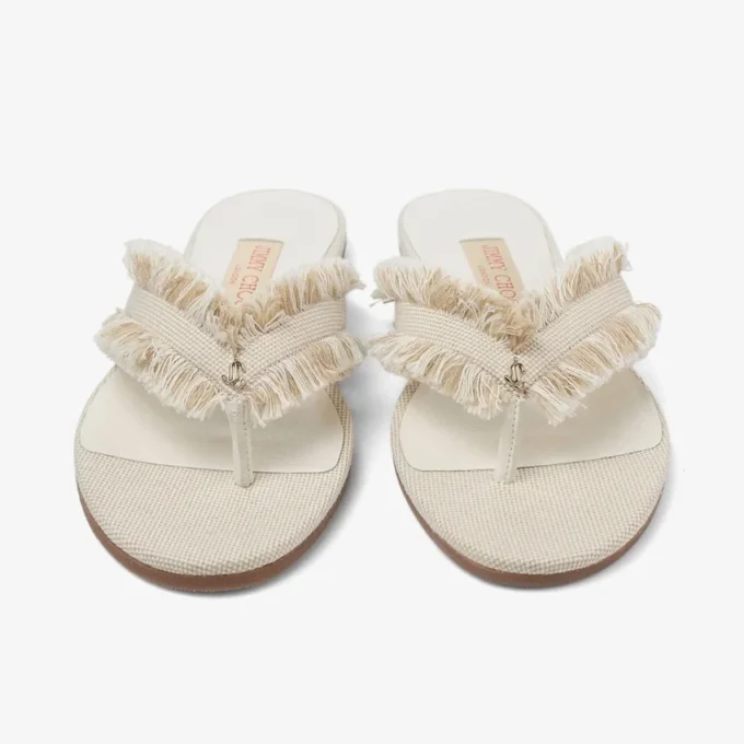 Bay Flat Amandelkleurige platte sandalen van gerafeld canvas met vlekjes Bay Flat Amandelkleurige platte sandalen van gerafeld canvas met vlekjes