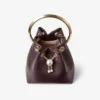 Bon Bon diepe merlotkleurige tas van bikerleer met parelsluiting Bon Bon diepe merlotkleurige tas van bikerleer met parelsluiting