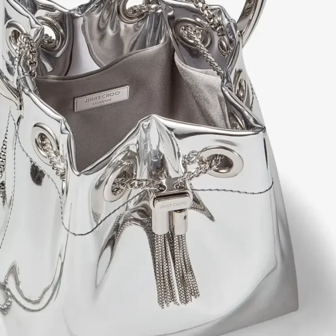 Bon Bon mini-tas van zilverkleurige spiegelstof met metalen handvat Bon Bon mini-tas van zilverkleurige spiegelstof met metalen handvat