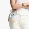 Bon Bon Riviera Blue Mix gespikkeld canvas en rieten bucket bag Bon Bon Riviera Blue Mix gespikkeld canvas en rieten bucket bag