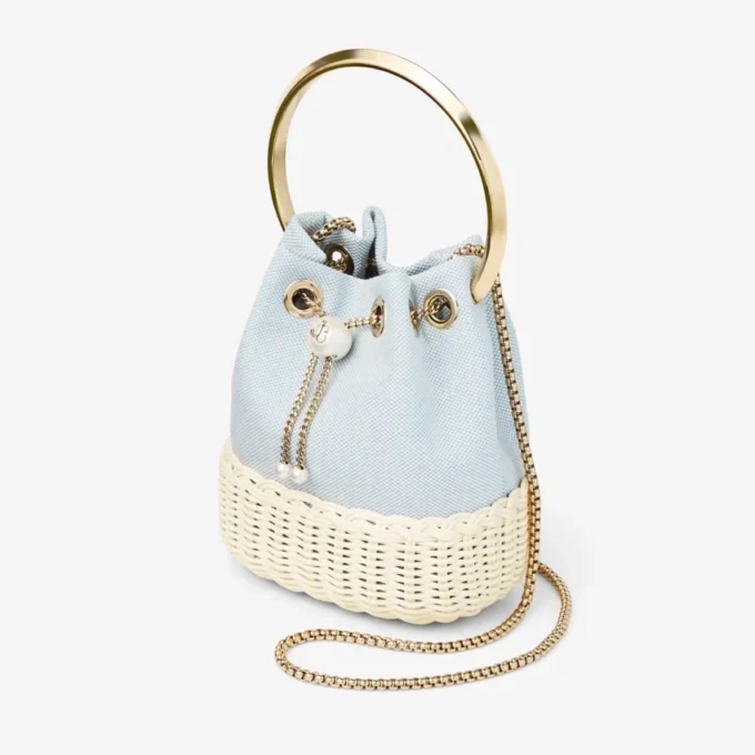 Bon Bon Riviera Blue Mix gespikkeld canvas en rieten bucket bag Bon Bon Riviera Blue Mix gespikkeld canvas en rieten bucket bag
