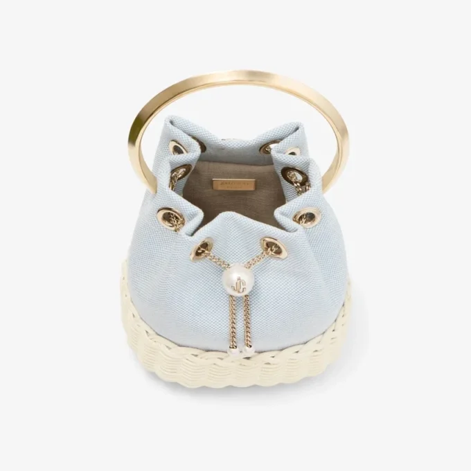 Bon Bon Riviera Blue Mix gespikkeld canvas en rieten bucket bag Bon Bon Riviera Blue Mix gespikkeld canvas en rieten bucket bag