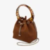 Bon Bon Tan suède bucket bag met kralensluiting en schildpadkleurig handvat Bon Bon Tan suède bucket bag met kralensluiting en schildpadkleurig handvat