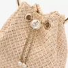 Bon Bon tas van natuurlijk raffia met parelsluiting Bon Bon tas van natuurlijk raffia met parelsluiting