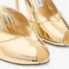 Brigitte Mule 100 Mules van goudkleurig vloeibaar metaal Brigitte Mule 100 Mules van goudkleurig vloeibaar metaal