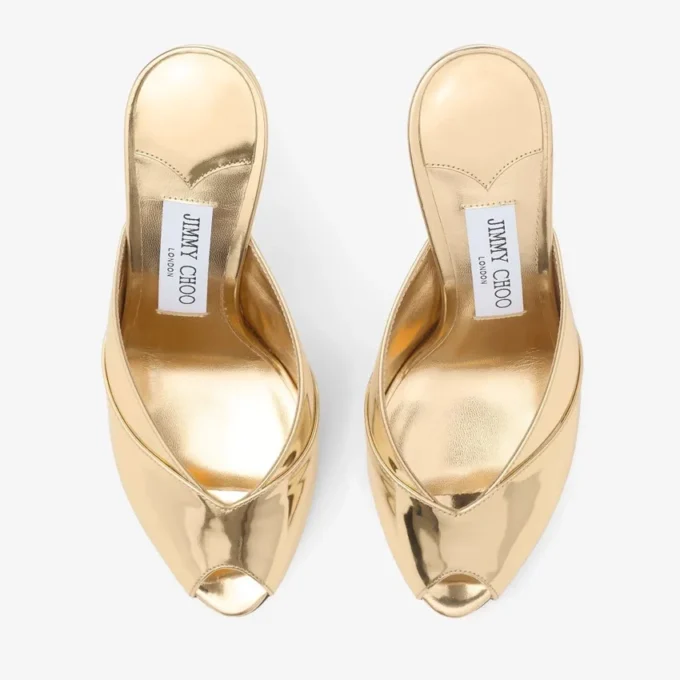 Brigitte Mule 100 Mules van goudkleurig vloeibaar metaal Brigitte Mule 100 Mules van goudkleurig vloeibaar metaal