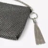 Callie zwarte clutch met Diamond-motief en kristallen hotfix op suède