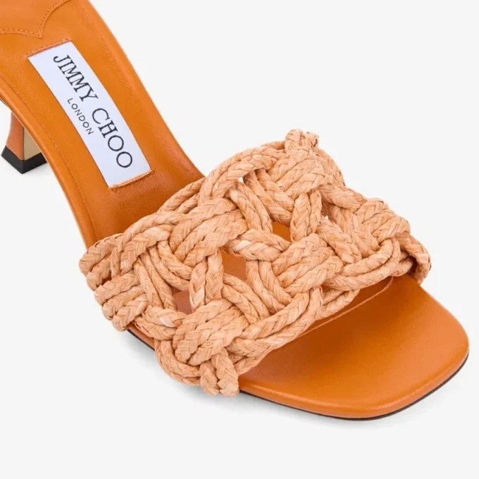 Chara 70 Sunset Orange muiltjes van gehaakt raffia en nappaleer Chara 70 Sunset Orange muiltjes van gehaakt raffia en nappaleer