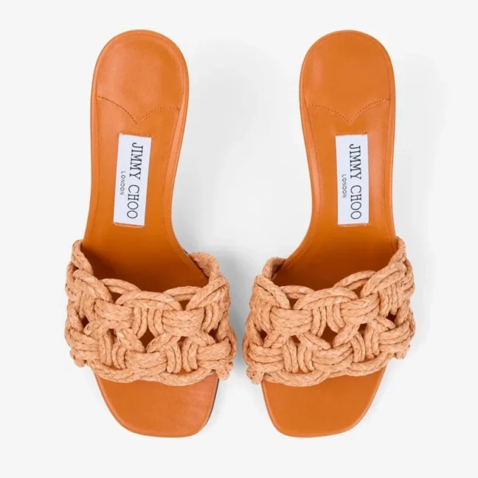 Chara 70 Sunset Orange muiltjes van gehaakt raffia en nappaleer Chara 70 Sunset Orange muiltjes van gehaakt raffia en nappaleer
