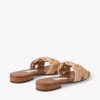 Chara Flat Tan leren en gehaakte raffia-slipper Chara Flat Tan leren en gehaakte raffia-slipper