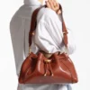 Cinch Medium Cognac Elaphe bedrukt leren schoudertas met biker-leren whipstitching
