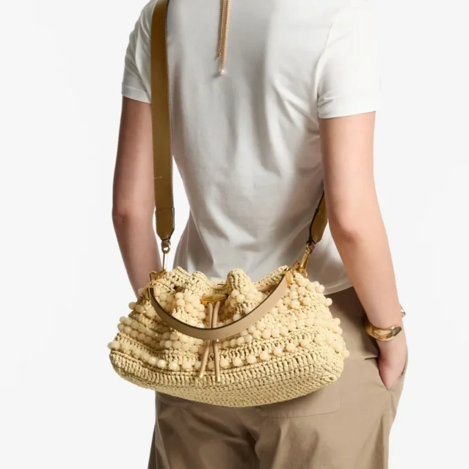 Cinch Medium natuurlijke en cappuccino raffia bucket bag met kralen en glad kalfsleer