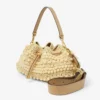 Cinch Medium natuurlijke en cappuccino raffia bucket bag met kralen en glad kalfsleer