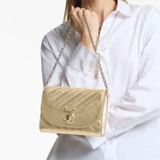Curve Clutch Glanzend goudkleurig gewatteerd metallic leren clutch met ketting