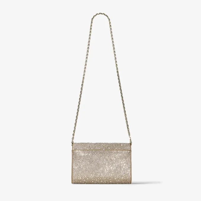 Curve Clutch Goudglanzende suède clutch met hotfix-kristallen