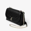 Curve Cross Body Medium Zwarte gewatteerde crossbodytas van bikerleer Curve Cross Body Medium Zwarte gewatteerde crossbodytas van bikerleer
