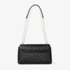 Curve Cross Body Medium Zwarte gewatteerde crossbodytas van bikerleer Curve Cross Body Medium Zwarte gewatteerde crossbodytas van bikerleer