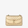 Curve Cross Body Small Goudkleurige gewatteerde metallic nappalederen crossbodytas Curve Cross Body Small Goudkleurige gewatteerde metallic nappalederen crossbodytas