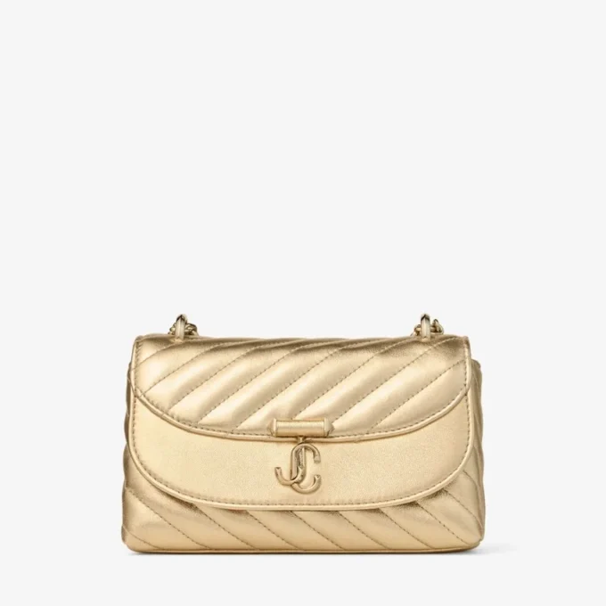 Curve Cross Body Small Goudkleurige gewatteerde metallic nappalederen crossbodytas Curve Cross Body Small Goudkleurige gewatteerde metallic nappalederen crossbodytas