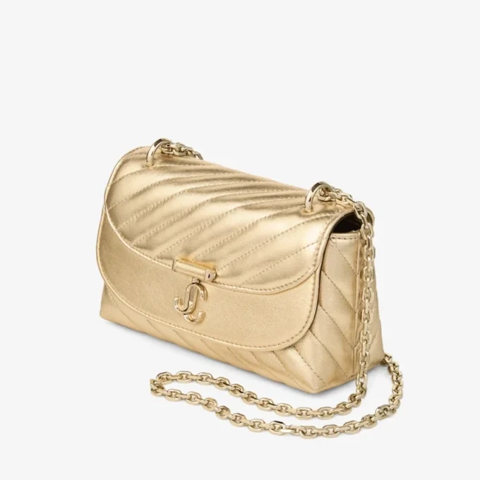 Curve Cross Body Small Goudkleurige gewatteerde metallic nappalederen crossbodytas Curve Cross Body Small Goudkleurige gewatteerde metallic nappalederen crossbodytas