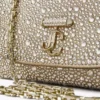 Curve Crossbody Small Goudglanzende suède crossbodytas met hotfix-kristallen Curve Crossbody Small Goudglanzende suède crossbodytas met hotfix-kristallen