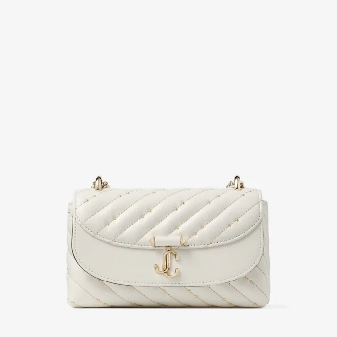 Curve Crossbody Small Latte gewatteerde nappalederen crossbodytas Curve Crossbody Small Latte gewatteerde nappalederen crossbodytas