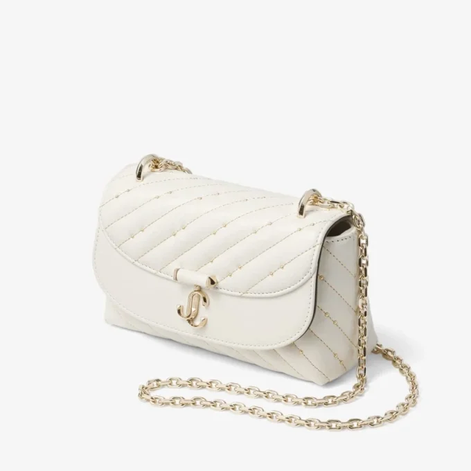 Curve Crossbody Small Latte gewatteerde nappalederen crossbodytas Curve Crossbody Small Latte gewatteerde nappalederen crossbodytas