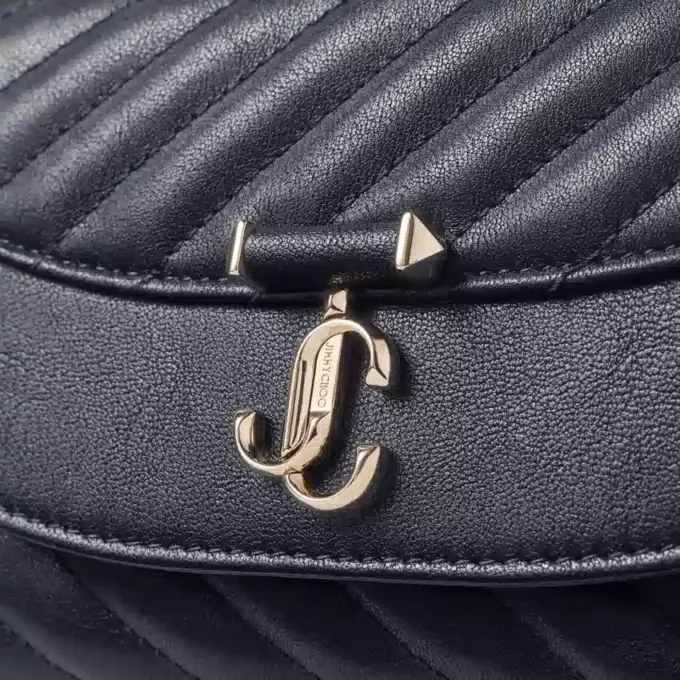 Curve Crossbody Small Marine gewatteerde crossbodytas van bikerleer