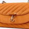 Curve Crossbody Small Sunset Orange gewatteerde suède crossbodytas