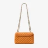 Curve Crossbody Small Sunset Orange gewatteerde suède crossbodytas