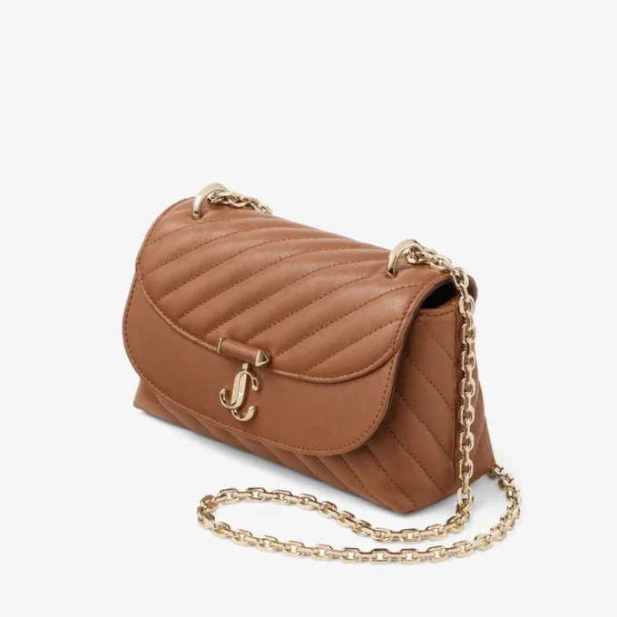 Curve Crossbody Small Tan gewatteerde crossbodytas van bikerleer Curve Crossbody Small Tan gewatteerde crossbodytas van bikerleer
