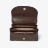 Curve Top Handle chocoladekleurige gewatteerde Biker-leren schoudertas met parelversieringen