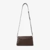 Curve Top Handle chocoladekleurige gewatteerde Biker-leren schoudertas met parelversieringen