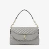 Curve Top Handle Dove gewatteerde Biker-leren tas met handvat en parelversiering