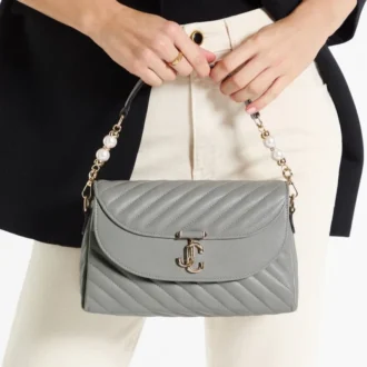 Curve Top Handle Dove gewatteerde Biker-leren tas met handvat en parelversiering