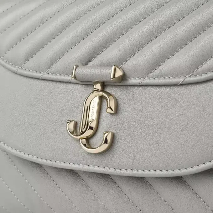 Curve Top Handle Dove gewatteerde Biker-leren tas met handvat en parelversiering