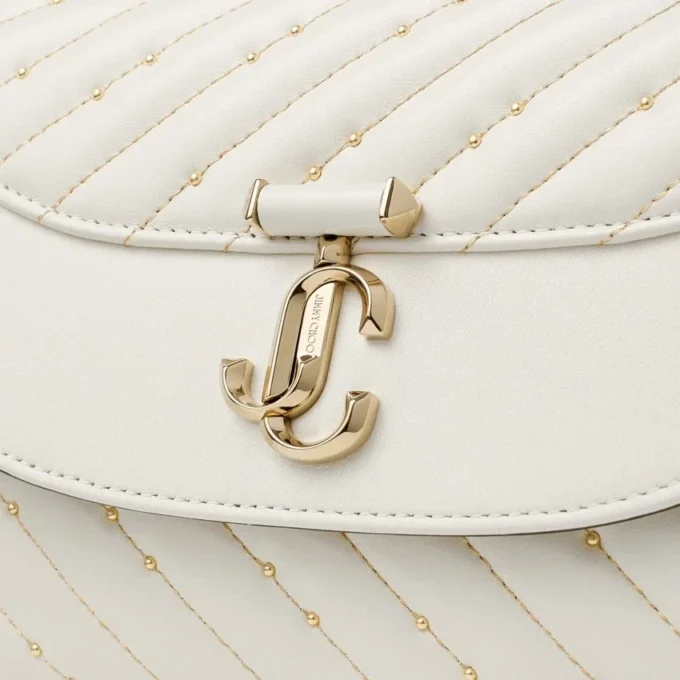 Curve Top Handle Latte gewatteerde nappalederen tas met handvat en parelversiering