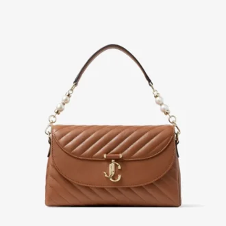 Curve Top Handle Tan gewatteerde Biker-leren tas met handvat en parelversiering