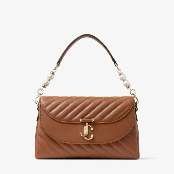 Curve Top Handle Tan gewatteerde Biker-leren tas met handvat en parelversiering